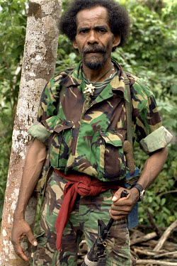 Member of Falantil pro-independence guerrilla forces in the jungle in the east of the island.