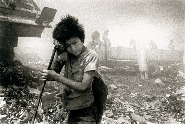 Child labour: Dozens of abandoned street kids live and work in the city's huge rubbish dump, collecting materials which can be reused. Most of them are addicted to glue.