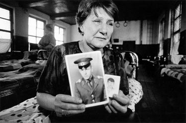 Lydia Andreevna, from Novo-Cheboksary in the Urals, in the Chechen schoolhouse where she has lived for four months. She abandoned her job and home to come and search for her son Vladimir, a conscript...
