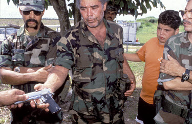 A paramilitary training camp in the Everglades where members of the Cuban right-wing Alpha 66 militia group undertake weapons exercises.