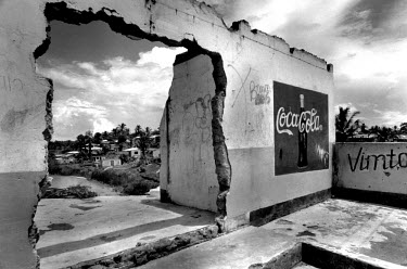 Graffiti and Coca Cola advertisement in the Manzese district.