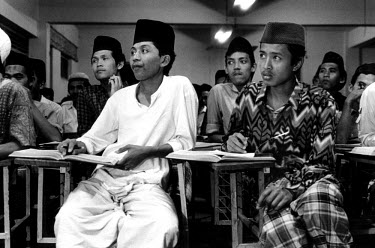 Students in the Assalafiyya pesantren (Islamic boarding school) studying the Koran.