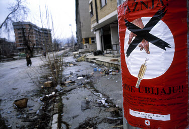 The Serbian area of town. A poster issued by the Red Cross warns against landmines.