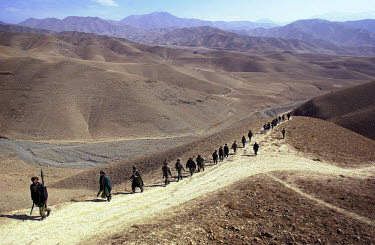 Northern Alliance soldiers on the march towards the Taloqan front line.