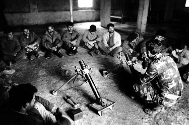 Weapons training for the armed forces of the Iraqi National Congress (INC). The INC is a coalition of all opposition to President Saddam Hussein, including Kurdish groups, and is based in Northern Ira...
