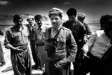 Kurdistan Democratic Party (KDP) leader Massoud Barzani discussing strategy with his commanders. Kurdistan.