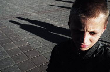 Aleksie, 13, lives on the streets and is addicted to glue and alcohol. He is one of approximately 10,000 street children in Riga. Most of their parents are either in gaol, alcoholic or dead.