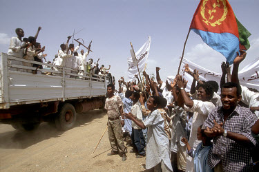 Crowds welcome the first convoy of Eritrean refugees back from over 30 years of exile at the Talatasher border crossing from Sudan to Eritrea. The Eritreans, many of whom took refuge in Shagarab Camp...