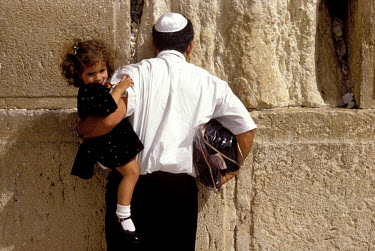 Father and daughter at the Wailing Wall (Western Wall).