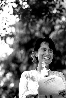 Aung San Suu Kyi, General Secretary of the National League for Democracy, delivering her regular Saturday speech to the general public outside her home.