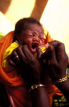 Oral vaccination for a newborn baby.