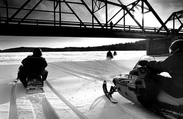 2001 saw the harshest winter in Maine for over a hundred years. Snowmobiles are perfect for the terrain, zipping through forests and across frozen rivers. But with speeds of up to a hundred miles an h...