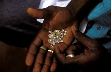 A handful of diamonds worth about $9,000 on the local market.Angola is the world's fourth largest diamond producer, generating $650m a year, although illegal mining and smuggling significantly distor...