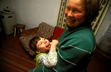 Vitali Balouskaya, 12, and his mother Ntaka, both of whom were born with physical and mental handicaps. On 29th August 1949 the first Russian plutonium bomb was exploded at the Semipalatinsk nuclear t...