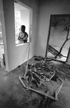 A stockpile of unexploded ordnance (UXO) in a recently renovated building, being gathered for destruction.After decades of civil war, a ceasefire agreement was signed between the government and the T...
