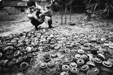 With the help of experts from the Mines Advisory Group (MAG), defused anti-personnel landmines are sorted before being destroyed in a controlled demolition. After decades of civil war, a ceasefire ag...