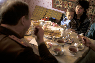 The wife of a military worker and her son, who has a kidney problem which can only be treated in the west. They are being visited by the KGB and the deputy mayoress of Kurchatov to discuss how they ca...