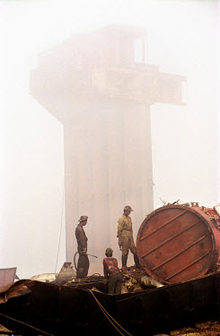 Ship-breaking yard on the Bay of Bengal. The industry employs thousands of workers and is the country's main source of steel, but injuries and deaths, often from explosions, are common. The environmen...