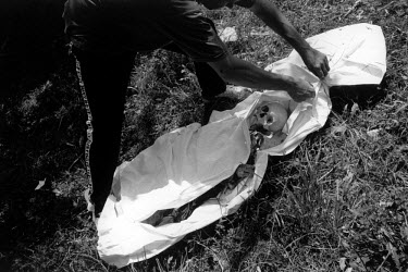 Members of the Commission for Missing Persons recover the remains of a man who was killed while trying to escape from Srebrenica in July 1995. Up to seven thousand men and boys were massacred by the S...