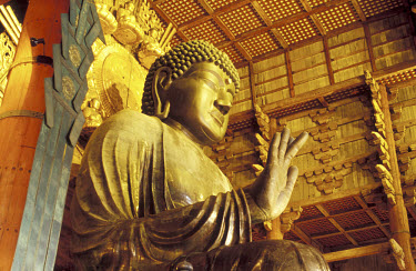 Huge 16m tall bronze Buddha inside the Daibutsu-den, the largest wooden structure in the world.