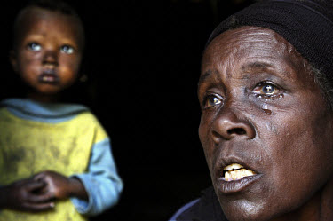 Sarah Urago with her grandchild. With tears in her eyes, she describes the suffering her family has endured. The severe drought in the south of the country has compounded problems caused by insufficie...
