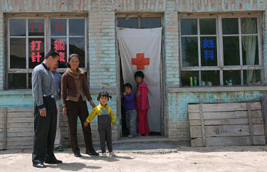 Xu Tao (28) and her husband Zhang Xin Zhong (26) run the rudimentary village pharmacy/clinic in Hu Kou. They dispense Western and traditional Chinese medicine to the 500 people of this village on the...