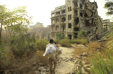 Destruction along the Green Line dividing the city, which was scattered with landmines.