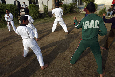 Iraqi children in a karate class at the Al-Magrhib Youth Club. The club, initiated by Unicef and Norwegian Church Aid, provides for after-school activities for local youths in the Baghdad district of...