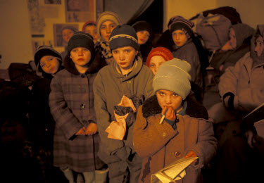 Children huddle together for shelter in the orphanage in Grozny. In December 1994 Russian troops entered Chechnya in an attempt to quash the country�s independence movement.  Early promises of a quick...