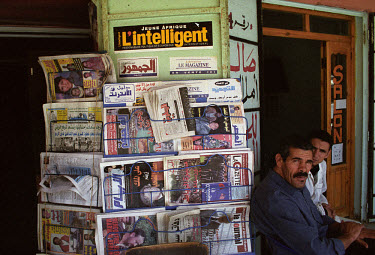 Men at a newsstand in Smarra, selling exclusively Moroccan publications. Western Sahara, a former Spanish colony, was annexed by Morocco in 1975.