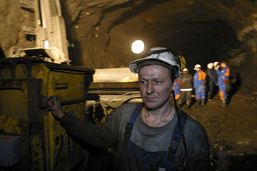 A worker in the deep shafts of the Taimyrsky nickel ore mine takes a break from drilling. Many people migrate to this resource-rich Siberian city above the Arctic Circle for work. Jobs with the Norils...