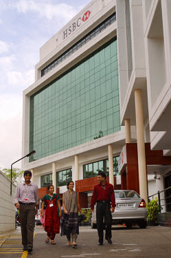 Workers emerging from the HSBC bank call centre. In recent years up to 800 call centres have opened in India as Western companies seek to take advantage of cheaper operating costs. Average salaries of...
