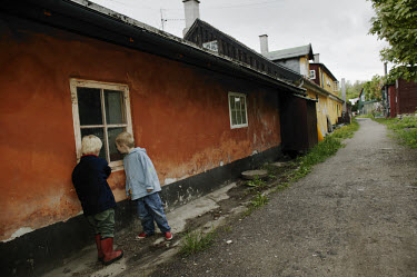 Children playing near old houses in Christiania.