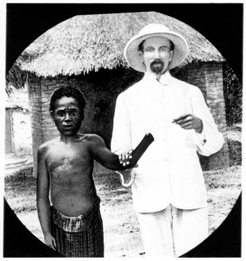 Swedish missionary and a young boy mutilated by a rubber sentry in the employ of a 'concessionnaire' company in the Upper Congo.  The Belgian Congo under King Leopold II employed mass forced labour of...