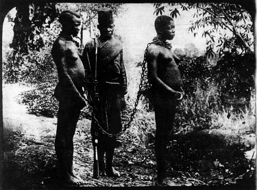Women hostages taken after their husbands fled into the forest to escape the rubber quotas. The Belgian Congo under King Leopold II employed mass forced labour of the indigenous population to extract...