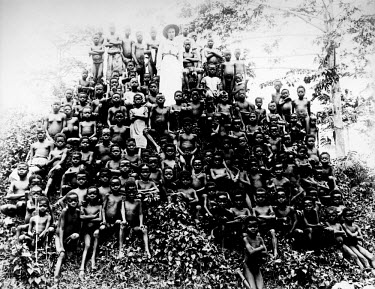 Alice Seeley Harris with a large group of Congolese children.   Alice Seeley Harris and her husband John Harris were missionaries in the Belgian Congo at the turn of the century. They produced a colle...