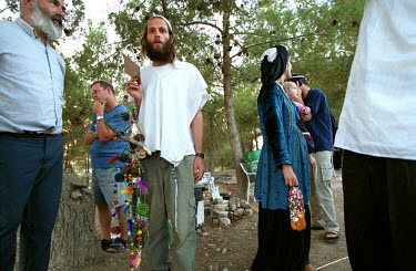 Residents of the Jewish settlement of Bat-A'in gather near the workshop area of an ecological festival.  The settlement is inhabited by ultra-orthodox Jews, maintaining an environmental-friendly way o...