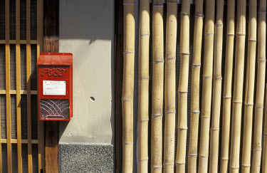 Bamboo and a post office box in the Gion district.