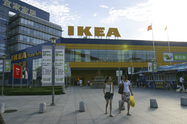 Customers exit an Ikea store.