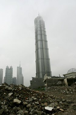 The Jin Mao Tower in the Pudong district, parts of which are still being cleared for further development.