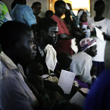 Mothers waiting for medical check ups for their children at a therapeutic feeding centre set up by Medecins Sans Frontieres (MSF) for internally displaced people (IDPs).  For 18 years the Lord's Resis...