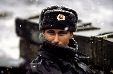 A Russian soldier at a checkpoint in winter.