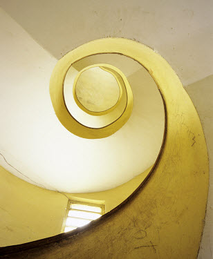 Spiral staircase. Asmara is a showcase of 1930s Italian Art Deco architecture. Initially created by colonial-era Italians, the style continued to flourish in the 1960s as local architects carried on t...