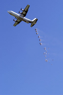 A United Nations World Food Programme (UN WFP) plane dropping food aid for the displaced population. In recent months villages along the river Nile in Shilluk Kingdom in the south of Sudan have been a...
