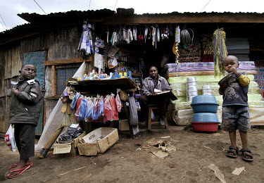 Cylus Kamau at his shop in the Kibera slums, which he opened with a micro-finance loan from K-Rep Bank.