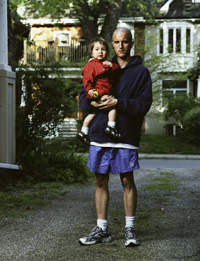 Jeremy Hinzman, who deserted from the US army because of his objections to the war in Iraq and has sought refugee status in Canada, with his son Liam.