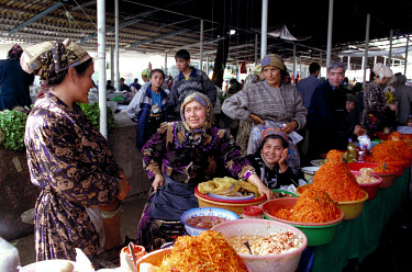 Women selling vegetables at market.
