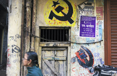 Communist graffiti of the type that adorns walls throughout the city.