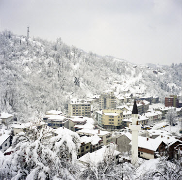 The town of Srebrenica under a layer of snow. Ten years after the end of the war, many buildings are still derelict.