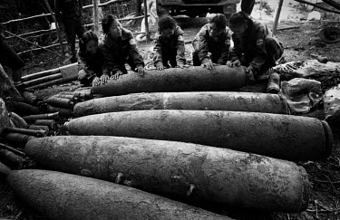 Several 500lb bombs being prepared for a controlled explosion by a Mines Advisory Group (MAG) team which came to clear the area of unexploded ordnance (UXO). Decades on, Laos is still living with the...
